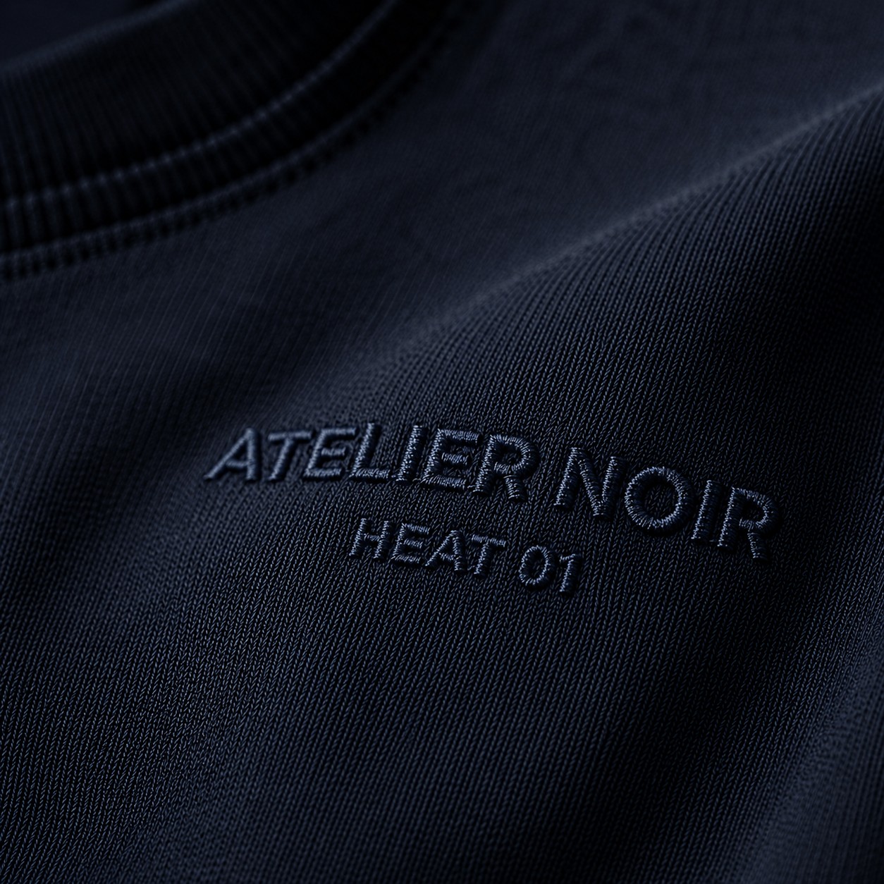 Titanium Navy — tonal embroidery detail