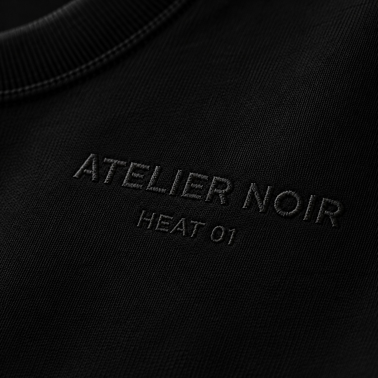 Void Black — tonal embroidery detail
